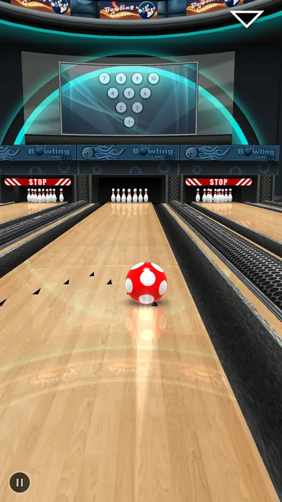 Bowling ball rolling down a polished wooden lane towards the pins